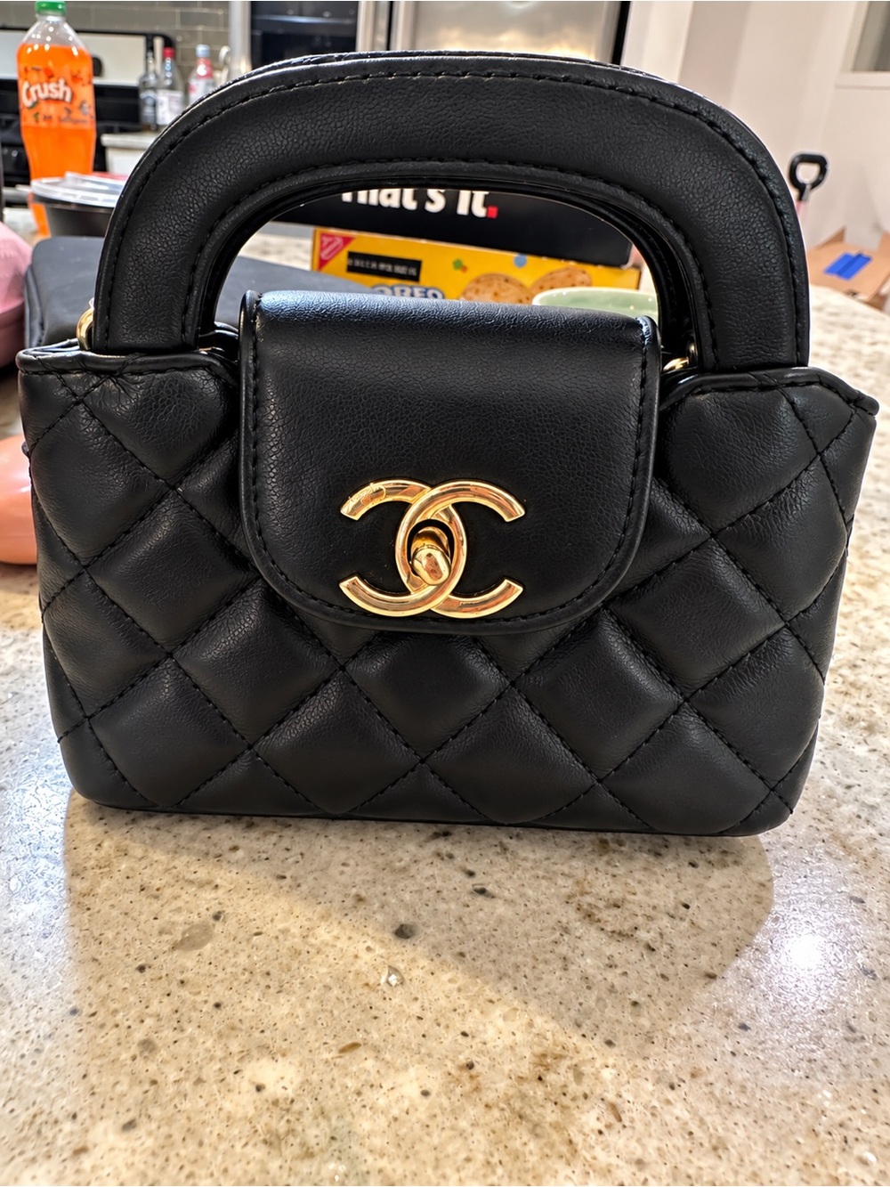 Unlisted Black Quilted Mini Top-Handle Bag with Gold Hardware
